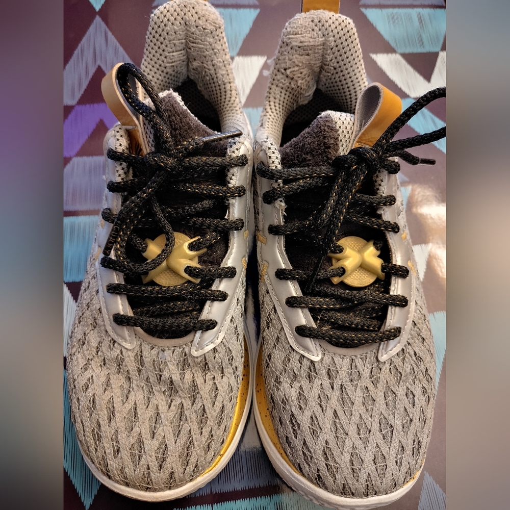 Under Armour Curry 10 Gray and Gold Athletic Sneakers